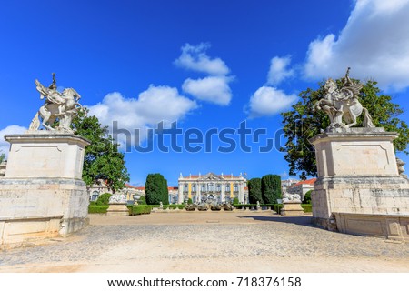 Statues at main entrance of gardens of Queluz National Palace in Sintra, Lisbon district, Portugal. The Royal Palace of Queluz was the summer residence of the Portuguese royal family.