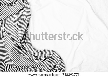 Bedding sheets with copy space. Flat lay, top view Royalty-Free Stock Photo #718393771