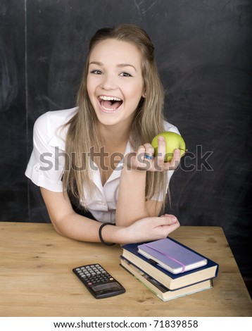 portrait of happy cute student in classroom