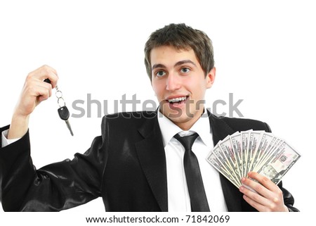 A young business  man  with his money and car keys on a white background