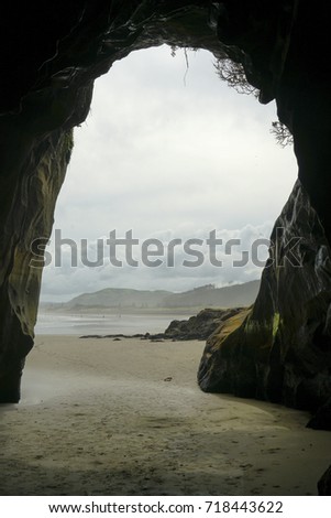 Muriwai Grotto in New Zealand Royalty-Free Stock Photo #718443622