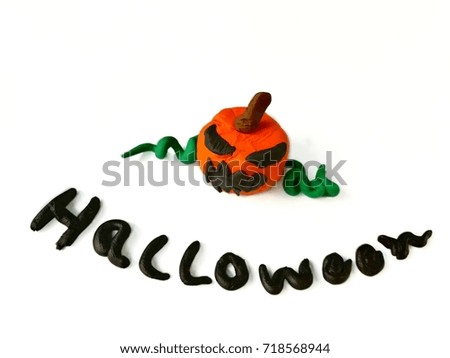 Halloween and Jack O'Lantern clay are multicolored plasticine place on a white background,orange pumpkin 