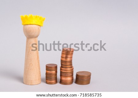 Symbol of a queen and a pile of coins