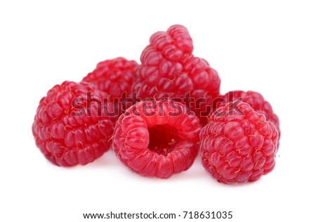 Close-up picture of a fantastic, beautiful group of raspberries with juicy texture isolated over the white background. Sweet raspberries for breakfast or a snack. Natural summer cooking concept.