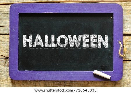 Conceptual Halloween ad on black chalkboard.