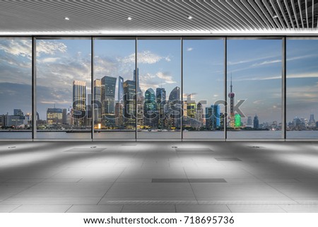 cityscape and skyline of shanghai from glass window
