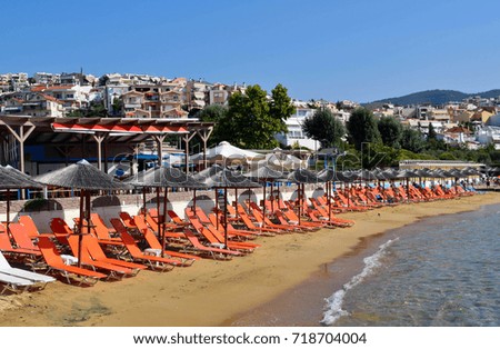Sun loungers on the beach in Kavala, Greece.
