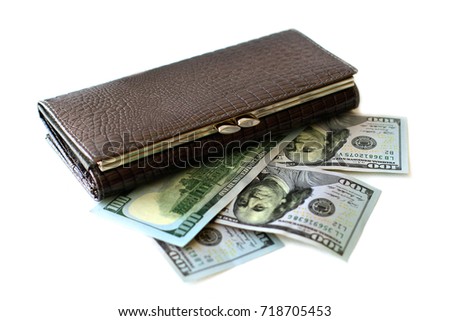Wallet and hundred dollar bills 