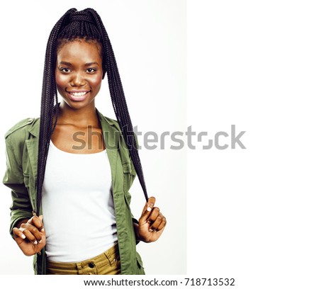 young pretty african-american girl posing cheerful emotional on 