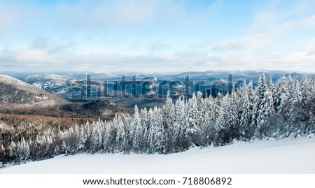 Winter view from ski slope on top of mountain - Mont-Tremblant, Quebec, Canada Royalty-Free Stock Photo #718806892