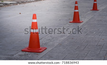 Traffic cones are lined up.
