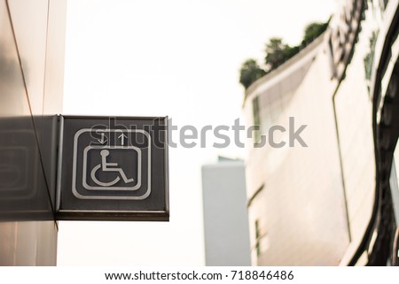 Handicapped elevator symbol. Handicap Elevator Sign on Metallic Wall