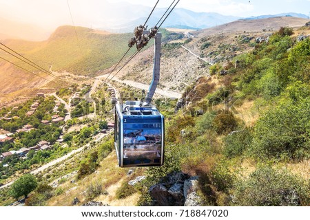 Wings of Tatev cableway, stretching from Halidzor to Tatev Monastery, is officially recorded by Guinness World Records as the world's longest non-stop double track cable car, Syunik Province, Armenia. Royalty-Free Stock Photo #718847020