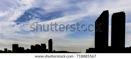 Blue sky with clouds and silhouette city. / Beautiful sky and silhouette city. / Abstract Background. ( Panorama View )