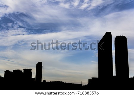 Blue sky with clouds and silhouette city. / Beautiful sky and silhouette city. / Abstract Background.