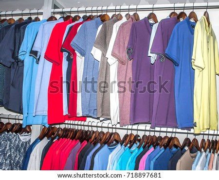 A number of shirts in the store