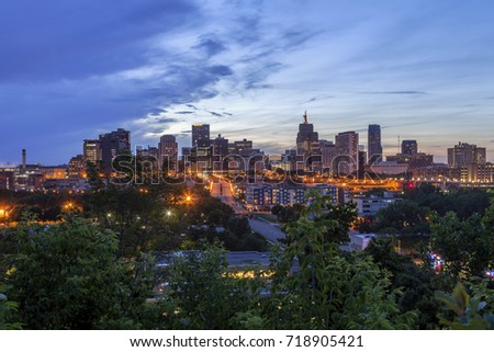 A Wide Angle Shot of the City Lights of St. Paul, Minnesota Coming On during a Summer Twilight