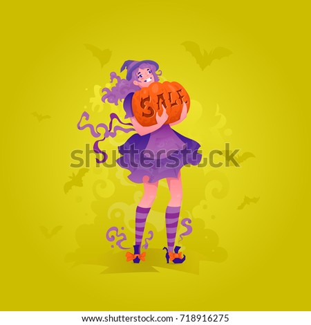 Cute redhead witch girl carrying pumpkin with sale word carved.