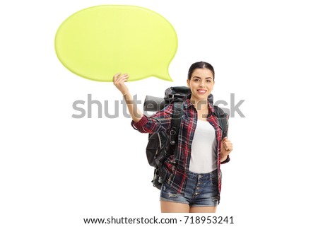 Female hiker holding a speech bubble isolated on white background
