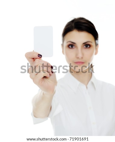 An image of young woman holding blank businesscard in hand. Focus on card