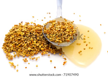 Pollen and honey in the spoon