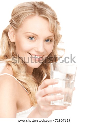 beautiful woman with glass of water over white