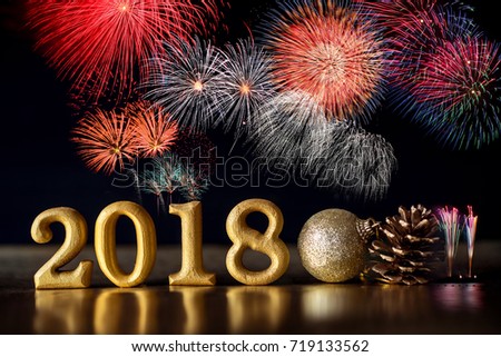 Golden Number 2018 placed on dark elegant glamour night tone background with celebration firework for happy new year and merry christmas 2018  concept