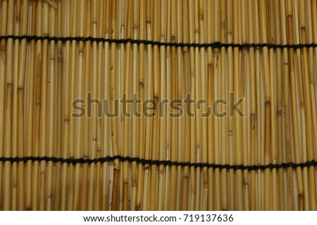 Bamboo wall background natural wooden texture. brown tone bamboo plank.