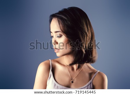 Portrait of a pretty asian woman in casual clothes. Asian beauty. Studio shot.