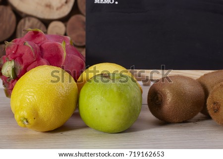 Set of different piles of fruits  over Wooden background. Healthy Concept