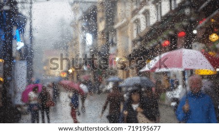 Raindrops with blurry background of people walking in the town, Sapa, Vietnam