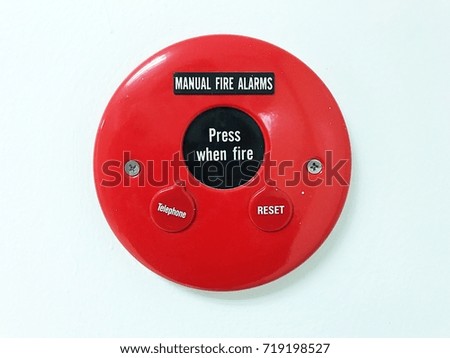 isolated close up red fire alarm sign with manual