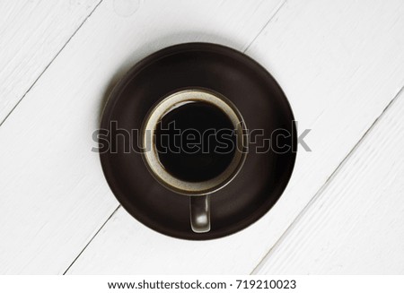 still life with coffee cup on wooden table background.flat lay.(selective focus)