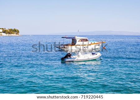 Scenic picture of a white yacht on the adriatic sea, dalmatian coast in Trogir, Croatia   White yacht on the adriatic sea, Trogir, Croatia