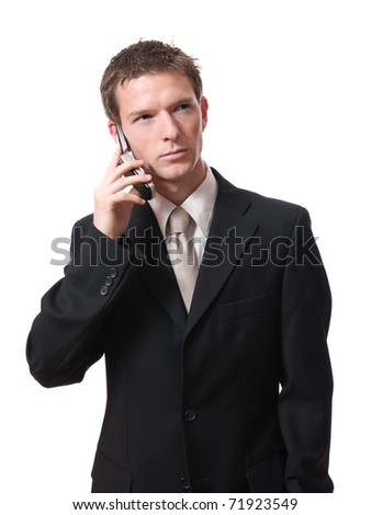 portrait of young serious businessman talking with cellphone isolated on white background