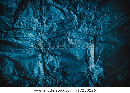 Black or dark blue folded paper background