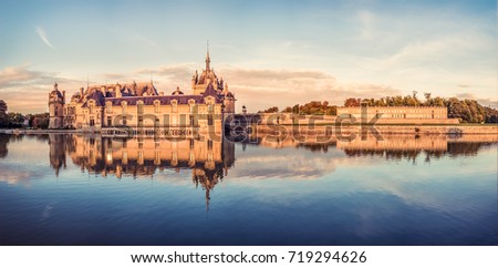 Chateau de Chantilly in the warm sunset light.