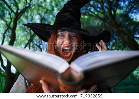 Picture of witch with open magic book