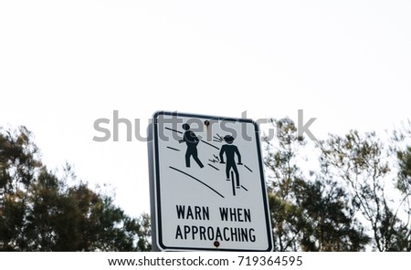 warning sign for a cyclist to warn people when approaching