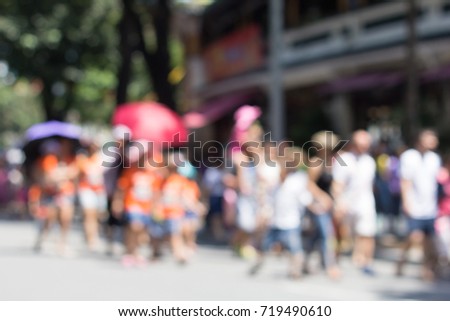 Blur and bokeh of pedestrians on the street
