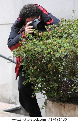 Paparazzo - Paparazzi - man taking pictures scoop - 