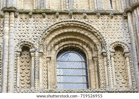 Architectural detail of window on the exterior wall of the Romanesque/Gothic style Ely Cathedral