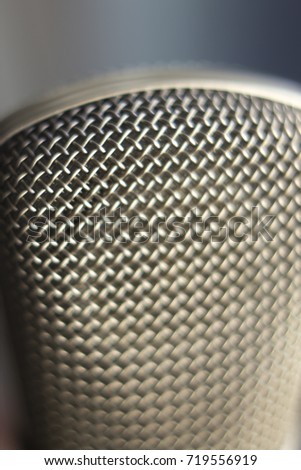 Large diaphragm condenser studio recording voice microphone to record professional voiceovers, singing and dubbing