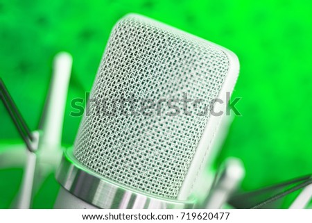 Large diaphragm condenser studio recording voice microphone to record professional voiceovers, singing and dubbing