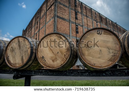 Bourbon barrels at a distillery along the Bourbon Trail in Kentucky.  Royalty-Free Stock Photo #719638735