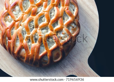 Beautiful and delicious macro cabbage pie with lattice for cafe, menu, shops, magazines, articles, design, prints, posters, restaurant, sites, web. Traditional european food from pastry and vegetables