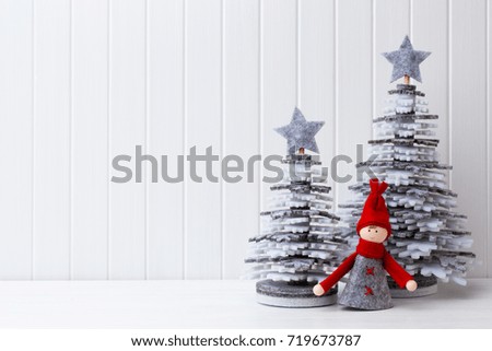 Christmas decoration on a white wooden background.
