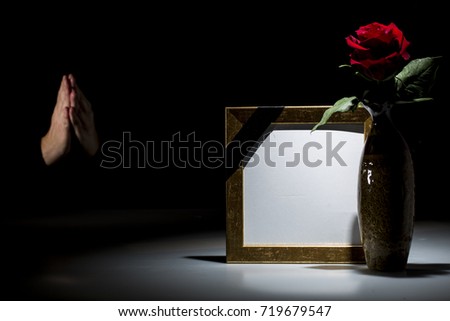 Blank mourning frame for sympathy card on dark background