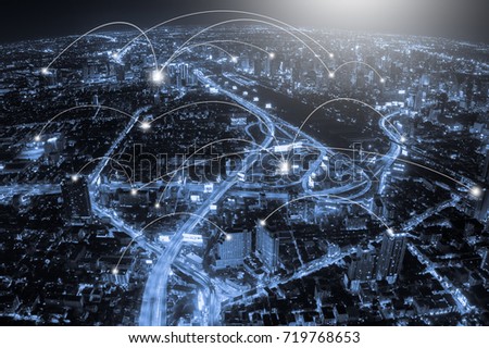 Aerial view, blue tone city and network connection concept