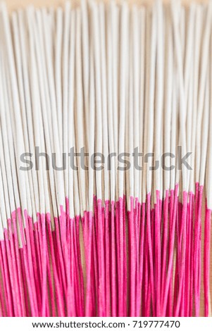 Close up picture of incense sticks use for worship in Buddhism and Hinduism in Asia.